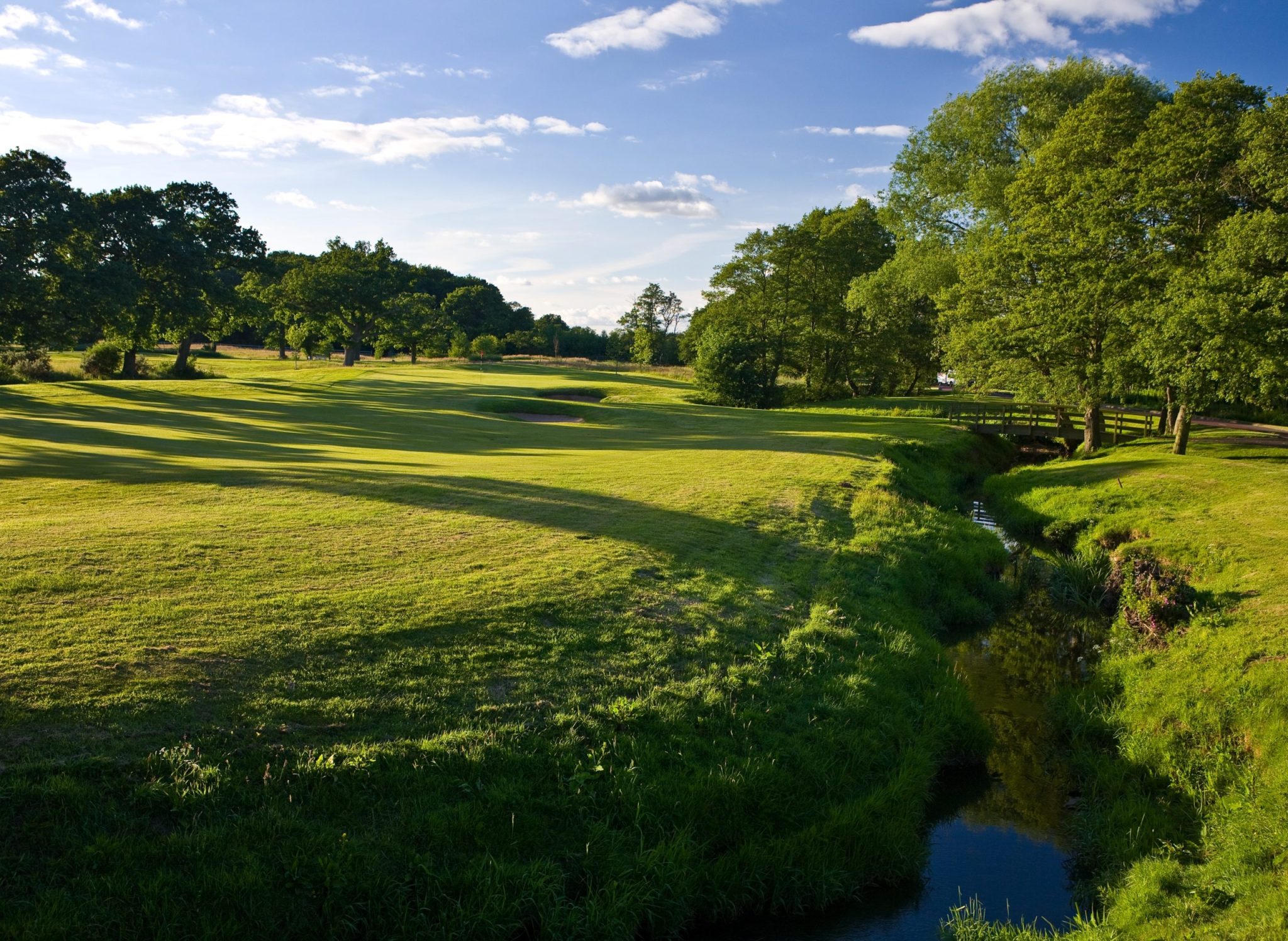Play golf in England at The Nicklaus Course at Carden Park.