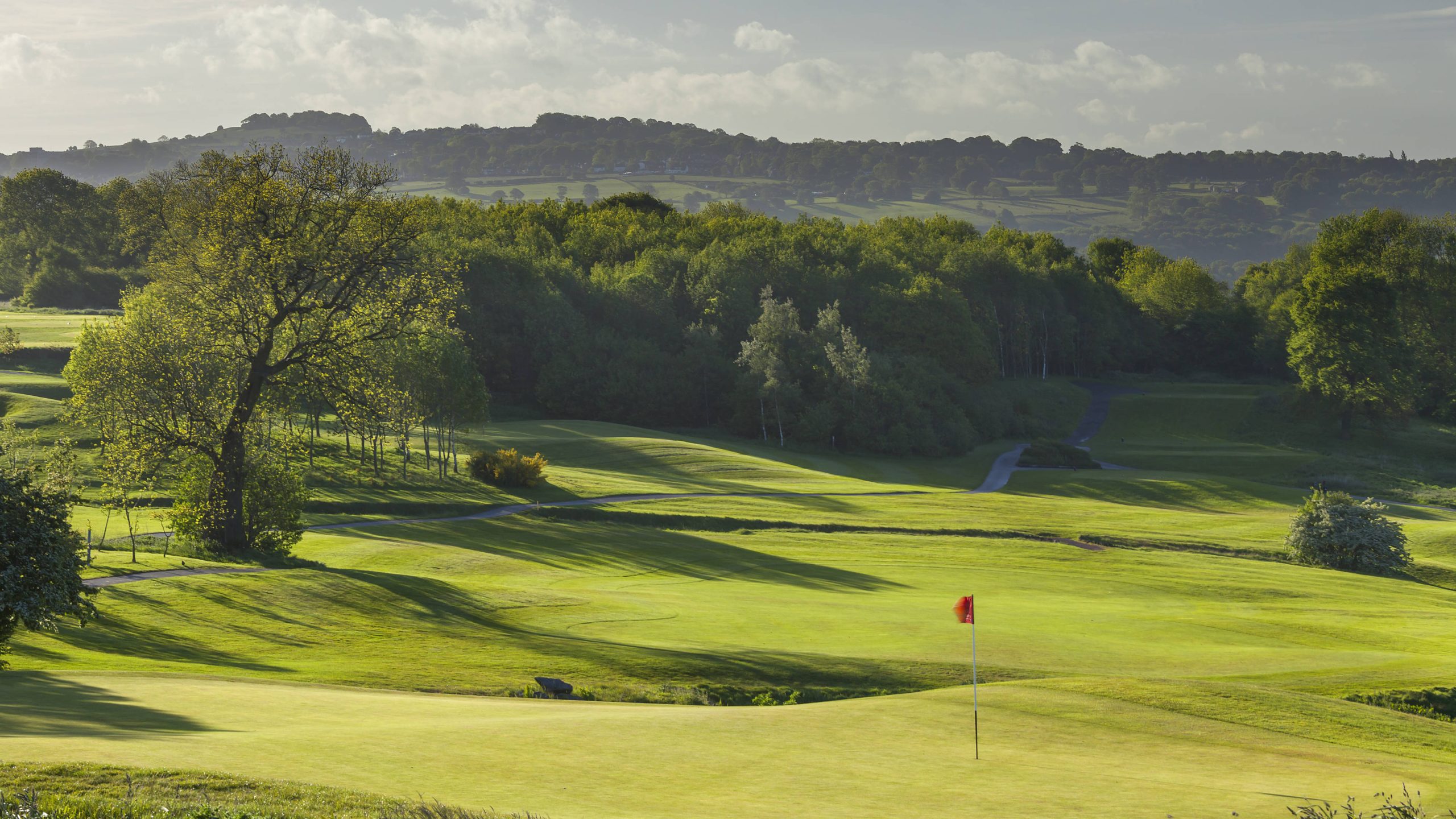 Play golf in England at Hollins Hall Golf Course.